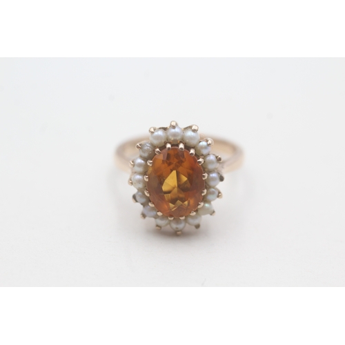 67 - 9ct gold citrine and split pearl halo set ring (4.6g) Size N 1/2