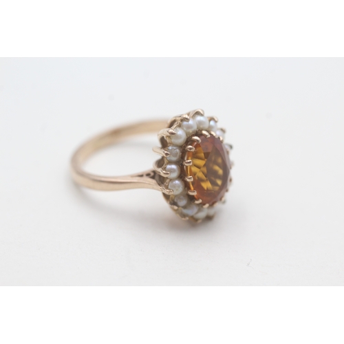 67 - 9ct gold citrine and split pearl halo set ring (4.6g) Size N 1/2