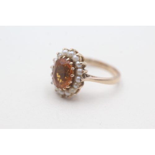 67 - 9ct gold citrine and split pearl halo set ring (4.6g) Size N 1/2