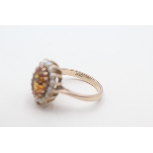 67 - 9ct gold citrine and split pearl halo set ring (4.6g) Size N 1/2