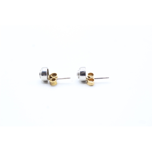 88 - 9ct white gold diamond single stone stud earrings (1.5g)