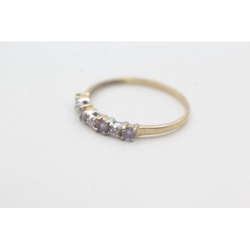 91 - 9ct gold tanzanite & diamond half eternity ring (1g) Size Q 1/2