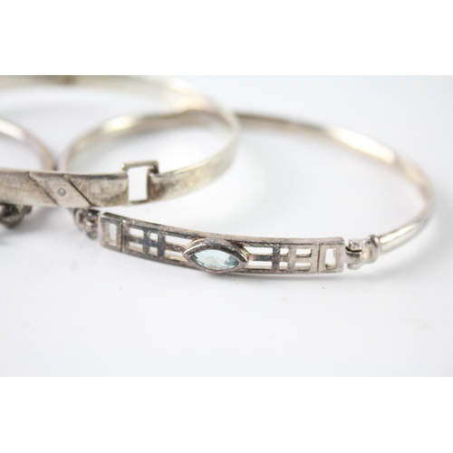 291 - Collection of Sterling Silver Bangles inc. Celtic, Diamond, Topaz x 3 33g