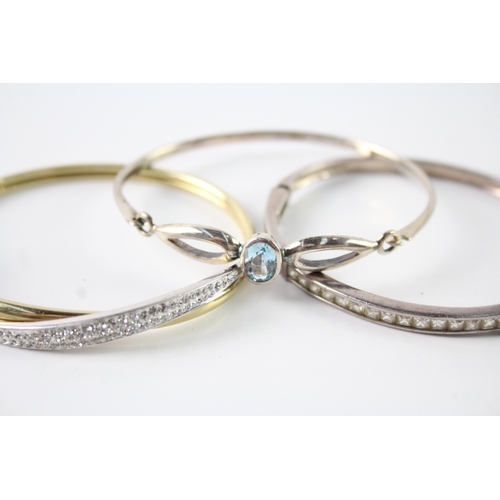 308 - Collection of Sterling Silver Bangles inc. CZ, Topaz, Wave, Gold Plate x 4 48g