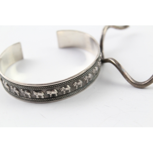 274 - Collection of Sterling Silver Bangles inc. Elephant, Wave, Snake x 3 52g