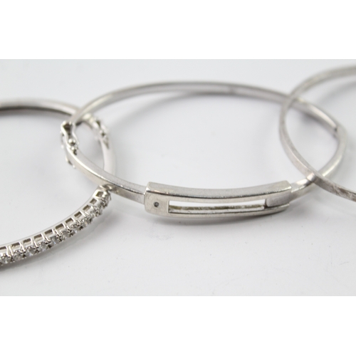 317 - Collection of Sterling Silver Bangles inc. Diamond, CZ, Modernist x 3 34g