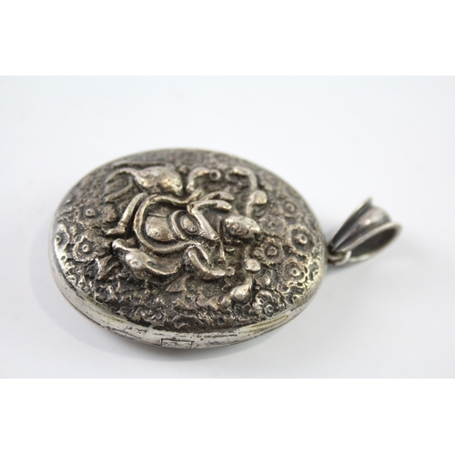 280 - Sterling Silver Tibetan Deity Repousse Locket 26g