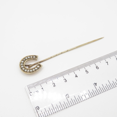 83 - 9ct gold antique seed pearl horseshoe stick pin (3.4g)