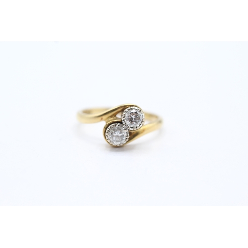 100 - 18ct gold diamond set bypass ring (3.8g) Size M 1/2