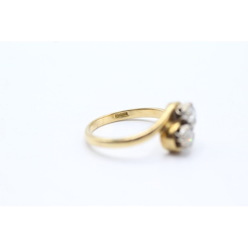 100 - 18ct gold diamond set bypass ring (3.8g) Size M 1/2