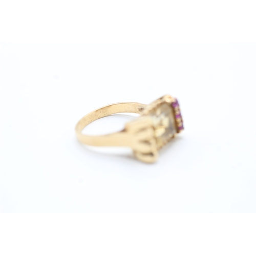 103 - 14ct gold citrine and ruby ring (4.6g) Size K