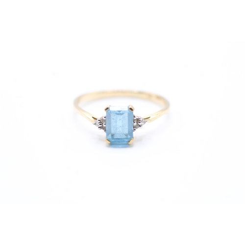 104 - 9ct gold blue topaz & diamond dress ring (1.5g) Size O 1/2