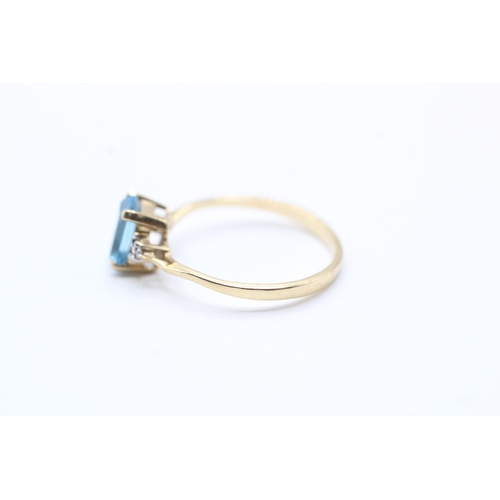 104 - 9ct gold blue topaz & diamond dress ring (1.5g) Size O 1/2