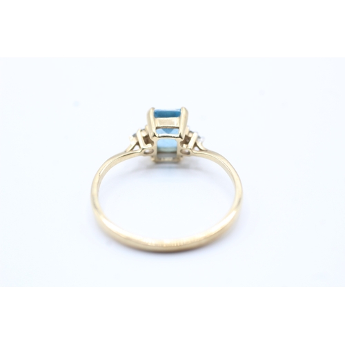 104 - 9ct gold blue topaz & diamond dress ring (1.5g) Size O 1/2