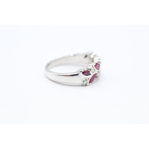 127 - 18ct white gold diamond & ruby dress ring (5.6g) Size M