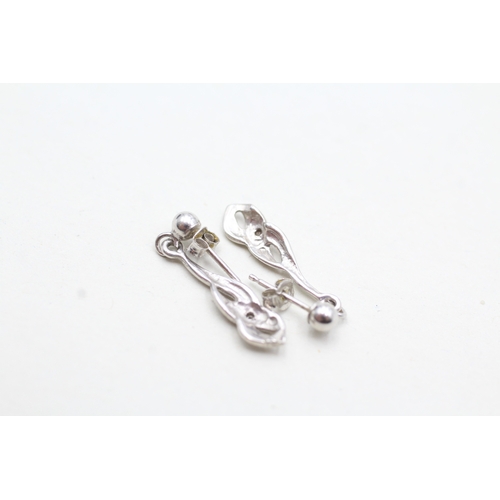 129 - 9ct white gold diamond drop earrings (0.9g)