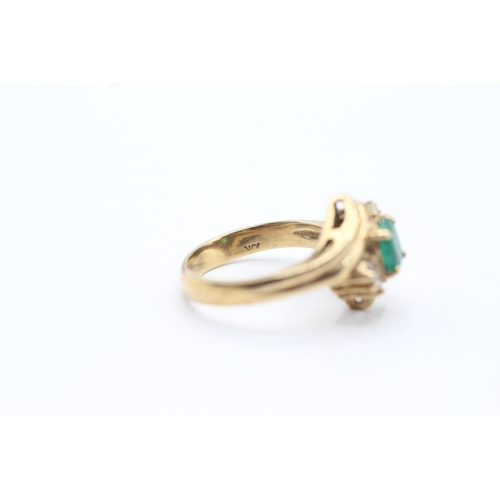 136 - 10ct gold emerald and diamond ring (4.2g) Size L