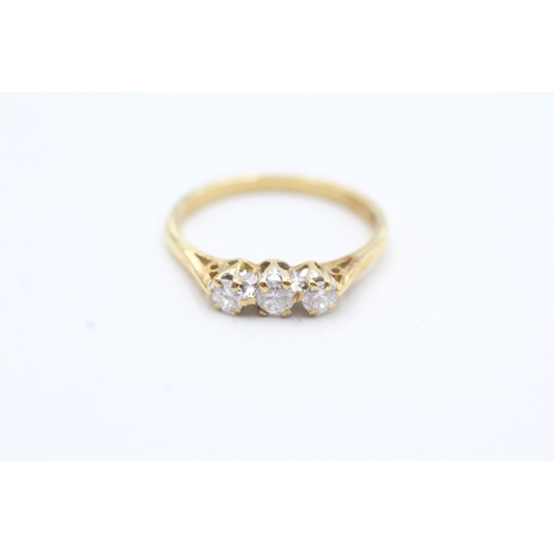 137 - 18ct gold diamond trilogy ring (2g) Size L 1/2