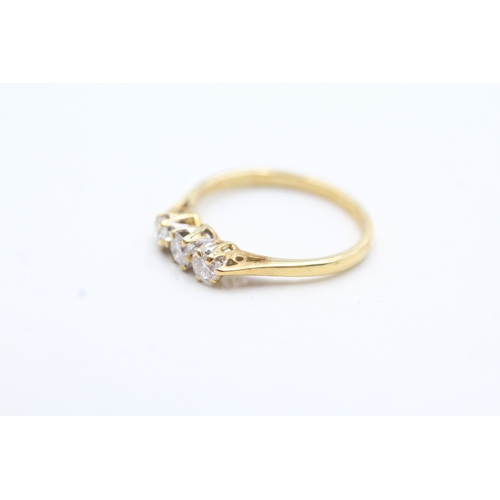 137 - 18ct gold diamond trilogy ring (2g) Size L 1/2