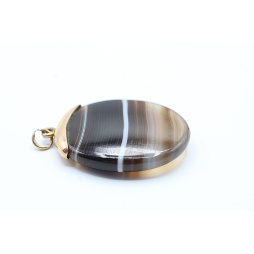 140 - 9ct gold agate pendant (3.2g)