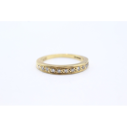 148 - 18ct gold diamond set eternity ring (3g) Size M