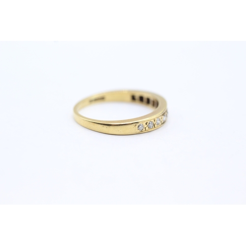 148 - 18ct gold diamond set eternity ring (3g) Size M