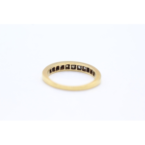 148 - 18ct gold diamond set eternity ring (3g) Size M