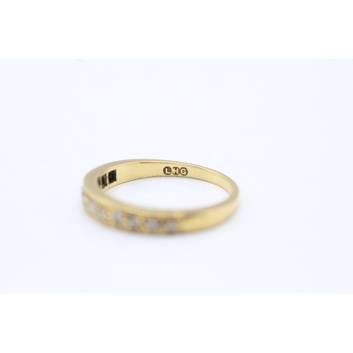 148 - 18ct gold diamond set eternity ring (3g) Size M