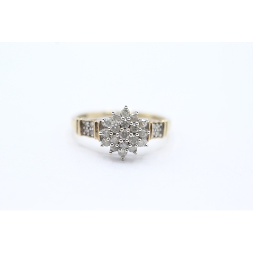 157 - 9ct gold diamond floral cluster ring (2.4g) Size R