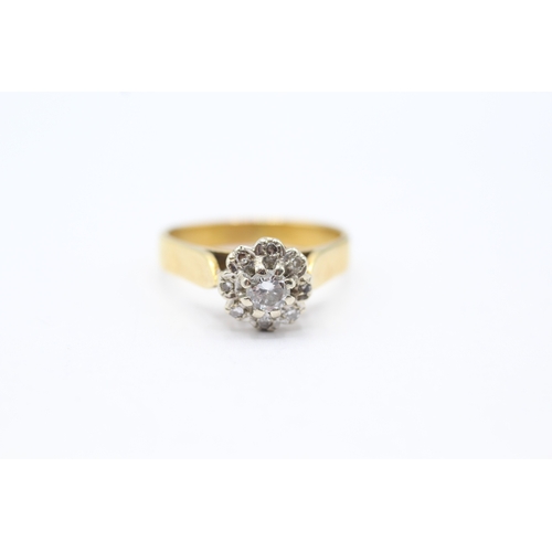 159 - 18ct gold diamond halo ring (4.3g) Size O