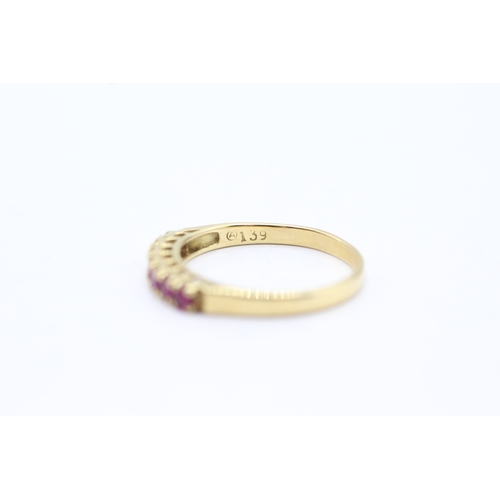 164 - 18ct gold ruby half eternity ring (2.5g) Size P