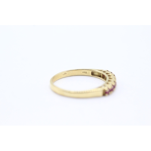 164 - 18ct gold ruby half eternity ring (2.5g) Size P