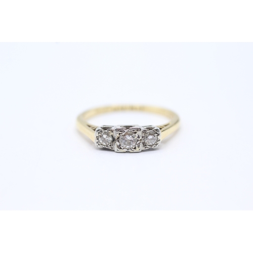 175 - 18ct gold three stone diamond ring (2.8g) Size O