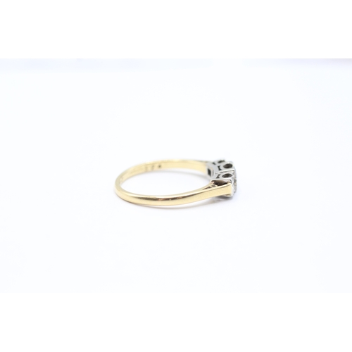 175 - 18ct gold three stone diamond ring (2.8g) Size O