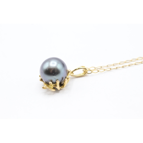 181 - 18ct gold cultured pearl set pendant on a 9ct gold chain (4.8g)