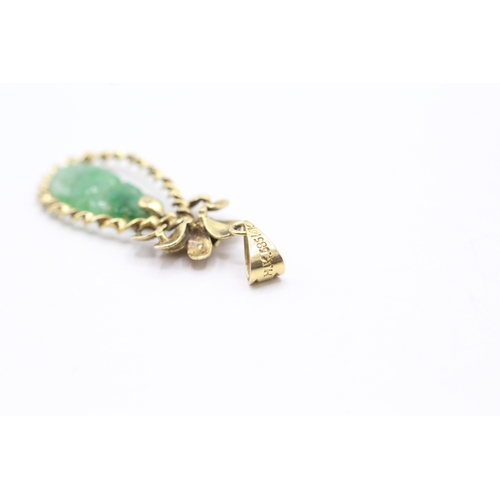 188 - 14ct gold vintage carved jade floral pendant (2.5g)