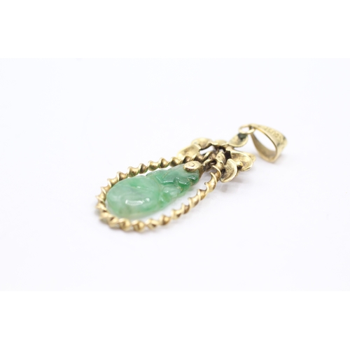 188 - 14ct gold vintage carved jade floral pendant (2.5g)