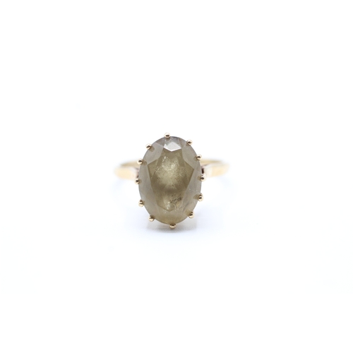 192 - 9ct gold vintage oval cut smokey quartz dress ring (3.7g) Size P