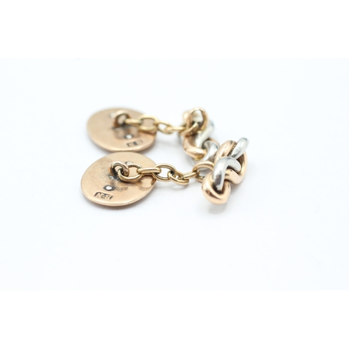 197 - 9ct gold and silver cufflinks (8.7g)