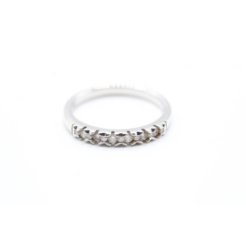 198 - 18ct gold diamond half eternity ring (3.1g) Size P