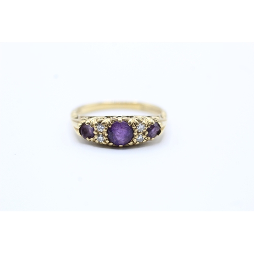 199 - 18ct gold amethyst & diamond dress ring (4.4g) Size O 1/2