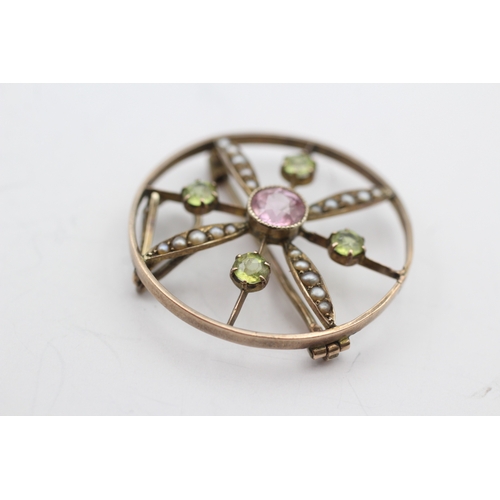 202 - 9ct gold antique seed pearl, synthetic pink sapphire, and peridot set pendant/brooch (4g)