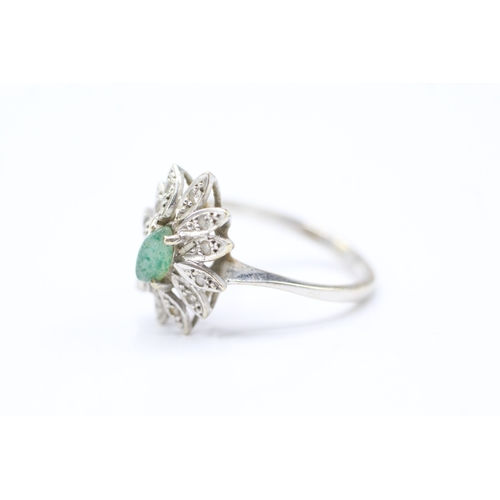 203 - 14ct white gold diamond and green gemstone halo ring (3.3g) Size M