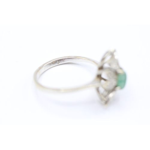 203 - 14ct white gold diamond and green gemstone halo ring (3.3g) Size M