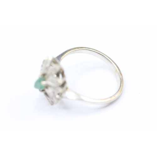 203 - 14ct white gold diamond and green gemstone halo ring (3.3g) Size M