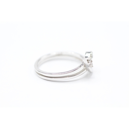 205 - 9ct white gold diamond twist band ring (2.3g) Size N