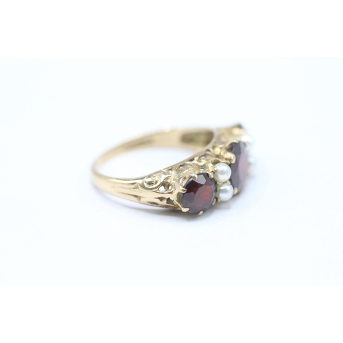 21 - 9ct gold garnet and faux pearl ring (2.9g) Size M