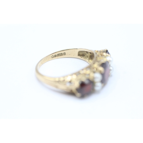 21 - 9ct gold garnet and faux pearl ring (2.9g) Size M