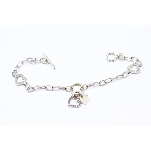 212 - 18ct white gold diamond and sapphire heart bracelet (5.6g)