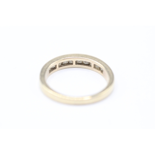 214 - 9ct gold princess cut diamond half eternity ring (2.7g) Size K